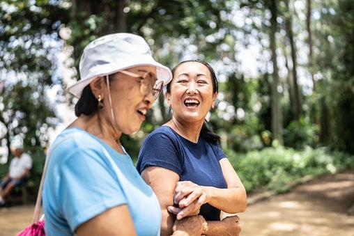 Mother and daughter laughing